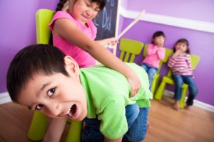 Boy getting spank in class